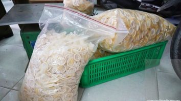 Police raid warehouse allegedly recycling USED condoms in Vietnam