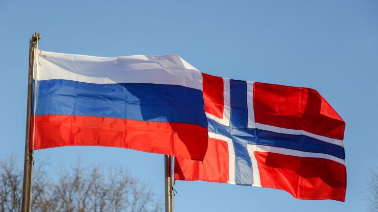 6050619 21.10.2019 Norwegian delegation of military service veterans during the laying of flowers at the obelisk, "Grieving Mother" in Murmansk region, Russia. The obelisk is part of the memorial complex, "Valley of Glory" in the Pechenga district of the Murmansk region. This event is part of the framework of events dedicated to the 75th anniversary of the end of the 1944 Petsamo-Kirkinessky operation during World War II.,Image: 478200674, License: Rights-managed, Restrictions: , Model Release: no