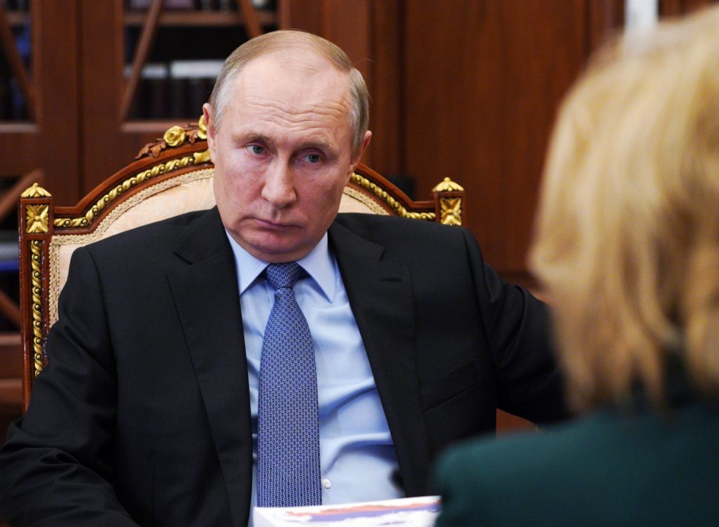 Vladimir Putin s-a plâns de "provocările" Ucrainei, într-o discuţie telefonică cu Angela Merkel