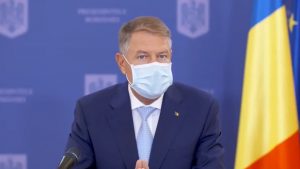 klaus iohannis cu masca pe față