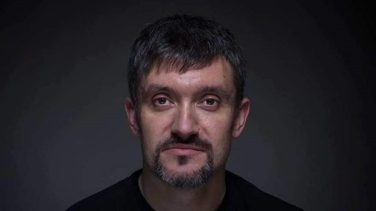 Polițist criminalist, premiat pentru o fotografie cu o mamă care își îngrijește pruncul nou-născut. FOTO