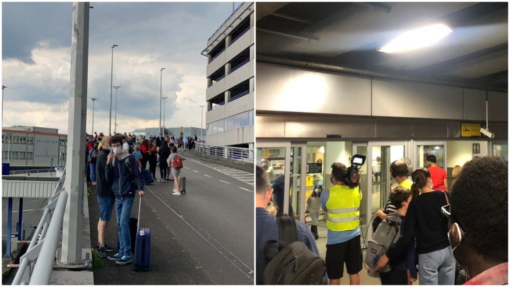 Oameni evacuați în aeroport Bruxelles.