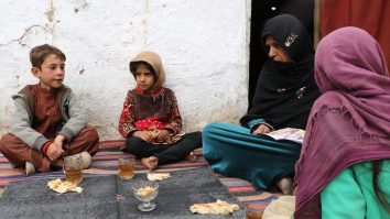 KABUL, AFGHANISTAN - MARCH 19: An Afghan woman and kids are seen in an adobe house as Afghan families, who lost their family members in the suicide bombings and war, suffer life difficulties in Kabul, Afghanistan, on March 19, 2021. According to the reports Moscow held Afghan peace talks process. Russia including the US, China and Pakistan called for an immediate ceasefire. Haroon Sabawoon / Anadolu Agency/ABACAPRESS.COM