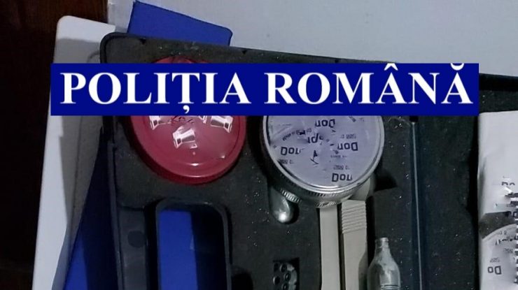pistoale pe o masă