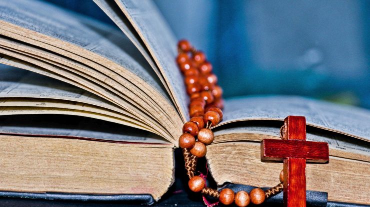 File photo dated August 5, 2016 of a Bible and a rosary. The head of an independent commission investigating child sexual abuse in the French Catholic church has said about 3,000 paedophiles have operated inside the institution since 1950. Days before publication of its report, Jean-Marc Sauvé said the commissions investigations had uncovered between 2,900 and 3,200 paedophile priests or other church members, adding that this was a minimum estimate. Photo by Gile/ANDBZ/ABACAPRESS.COM