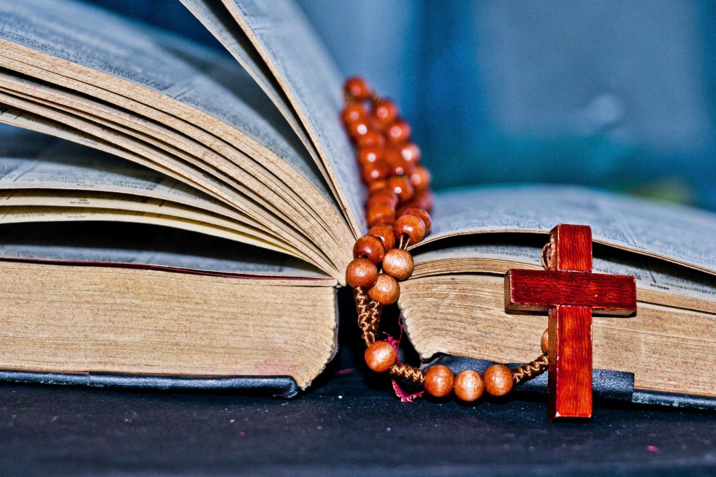 File photo dated August 5, 2016 of a Bible and a rosary. The head of an independent commission investigating child sexual abuse in the French Catholic church has said about 3,000 paedophiles have operated inside the institution since 1950. Days before publication of its report, Jean-Marc Sauvé said the commissions investigations had uncovered between 2,900 and 3,200 paedophile priests or other church members, adding that this was a minimum estimate. Photo by Gile/ANDBZ/ABACAPRESS.COM