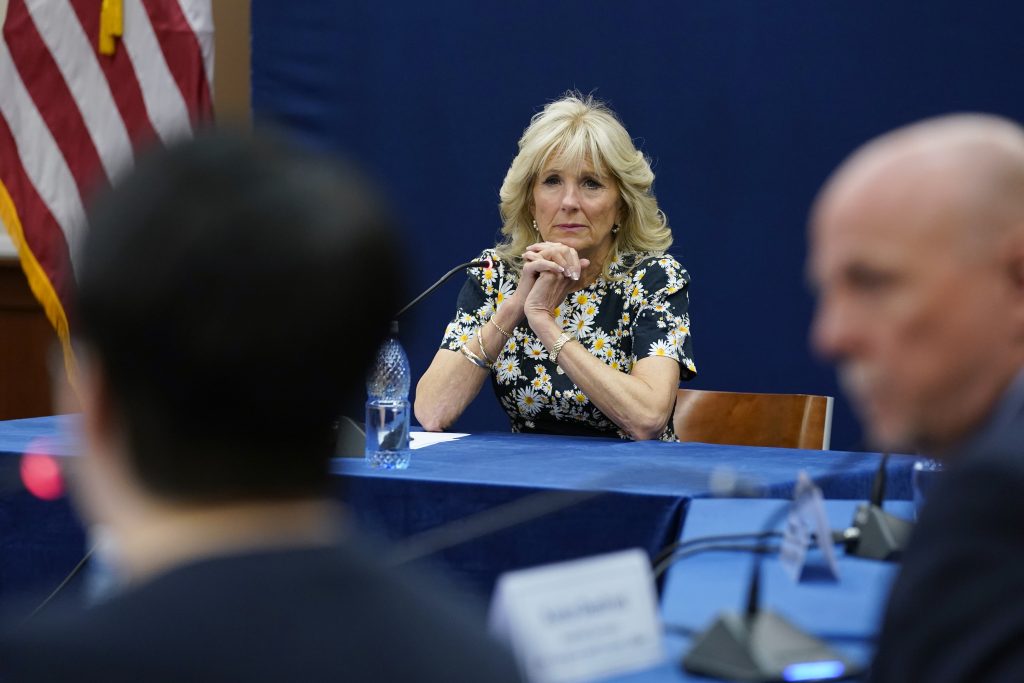 First lady Jill Biden listens during a briefing on humanitarian efforts for those displaced by the war in Ukraine from United Nations agencies, NGOs, and the Romanian government during a visit to the U.S. Embassy in Bucharest, Romania., Saturday, May 7, 2022. (AP Photo/Susan Walsh, Pool)