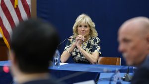 First lady Jill Biden listens during a briefing on humanitarian efforts for those displaced by the war in Ukraine from United Nations agencies, NGOs, and the Romanian government during a visit to the U.S. Embassy in Bucharest, Romania., Saturday, May 7, 2022. (AP Photo/Susan Walsh, Pool)