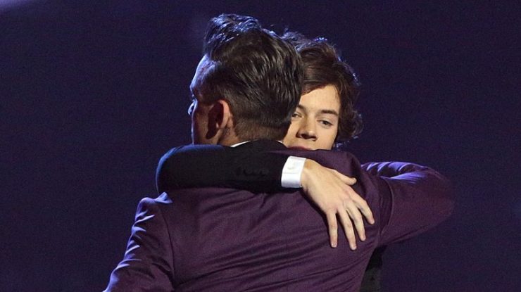 Robbie Williams spune că „vede mult din el însuși” în starul pop Harry Styles