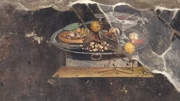 Arheologii au descoperit o pictură care înfățișează „un strămoș al pizzei” într-o casă veche din Pompei
