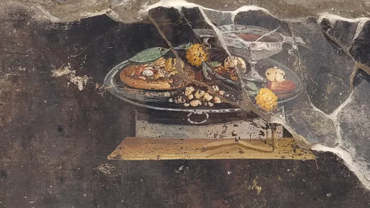 Arheologii au descoperit o pictură care înfățișează „un strămoș al pizzei” într-o casă veche din Pompei