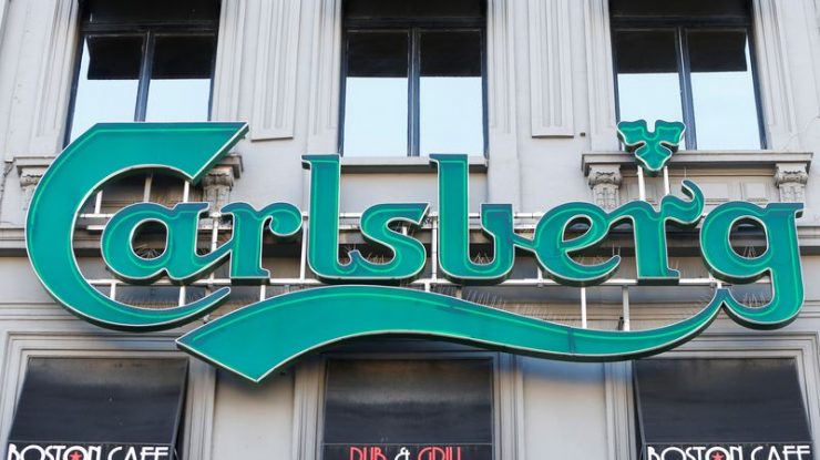 Rusia confiscă filialele Danone și Carlsberg. Răspunsul companiilor mamă