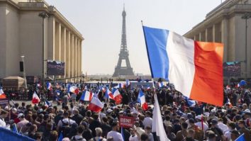 Cum va fi integrată Flacăra Olimpică în parada de Ziua Națională a Franței