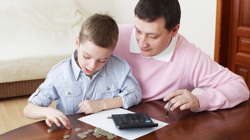 FATHER TEACHING SON FINANCIAL EDUCATION