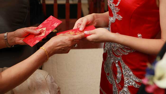 Un hoț a furat 40.000$ din plicuri, la o nuntă din Singapore. Poliția a recuperat doar 1.600$ la momentul arestării