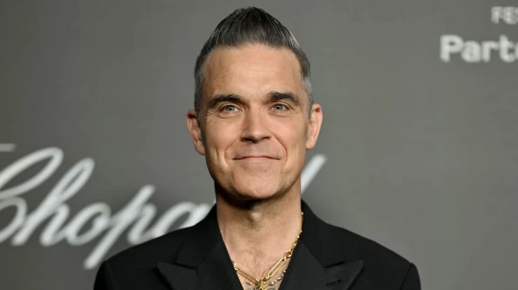 Robbie Williams a fost numit ambasador muzical al FIFA. Artistul va cânta la festivitatea de deschidere a Cupei Mondiale