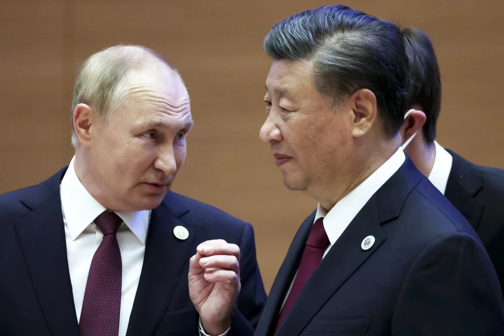 Xi