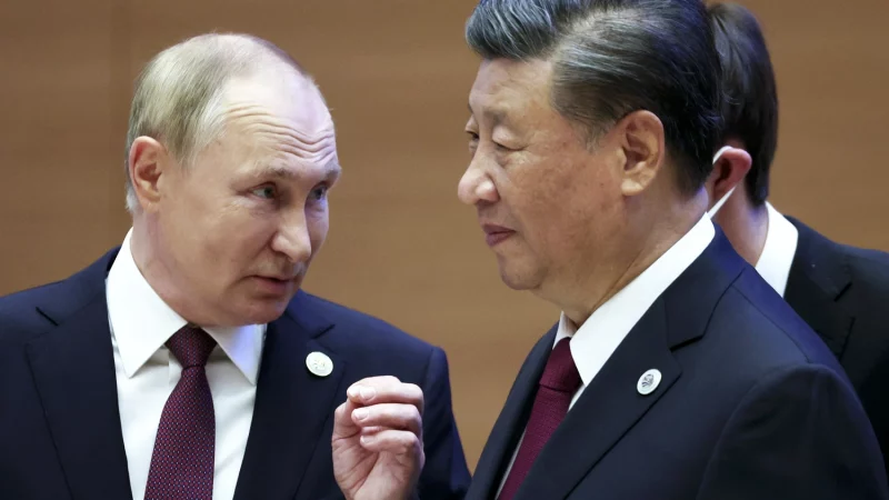 Xi